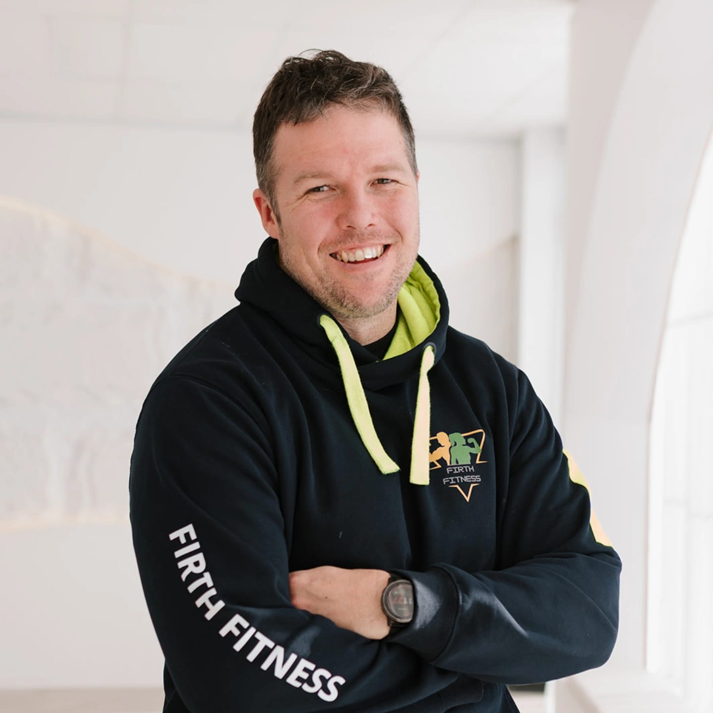 Peter wearing Firth Fitness branded hoodie - showcasing professional fitness brand identity